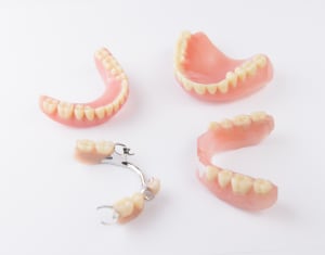 Full dentures and partial dentures.
